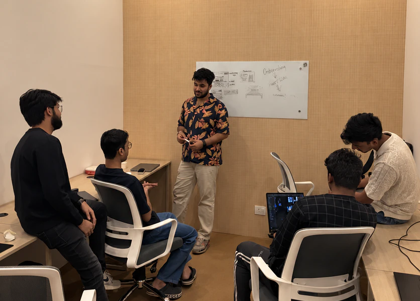 Bricx designers working through a whiteboard session in the studio
