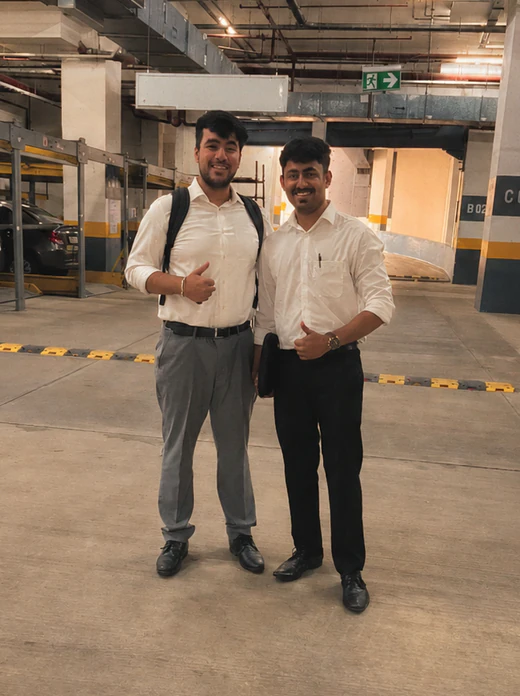Two Bricx teammates posing together