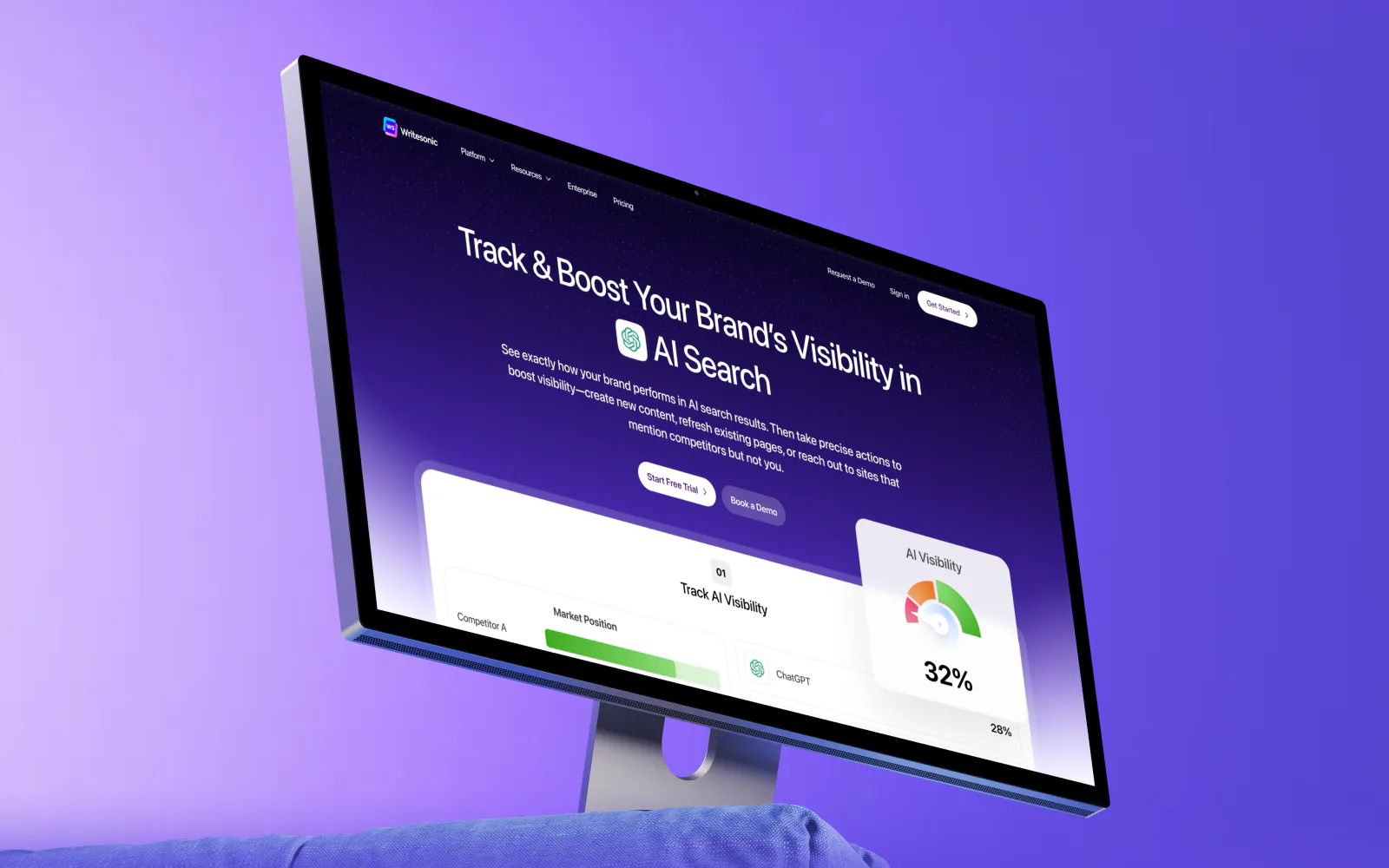 Writesonic's AI search visibility platform designed by Bricx, showing the headline 'Track and Boost Your Brand's Visibility in AI Search' on a desktop monitor